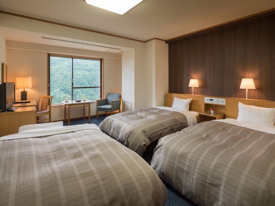 Twin Room, Non Smoking (A) | In-room safe, desk, free WiFi, bed sheets