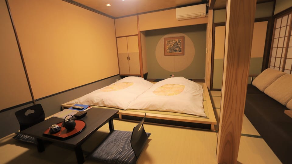 Japanese-style Room, Non Smoking | Down comforters, in-room safe, desk