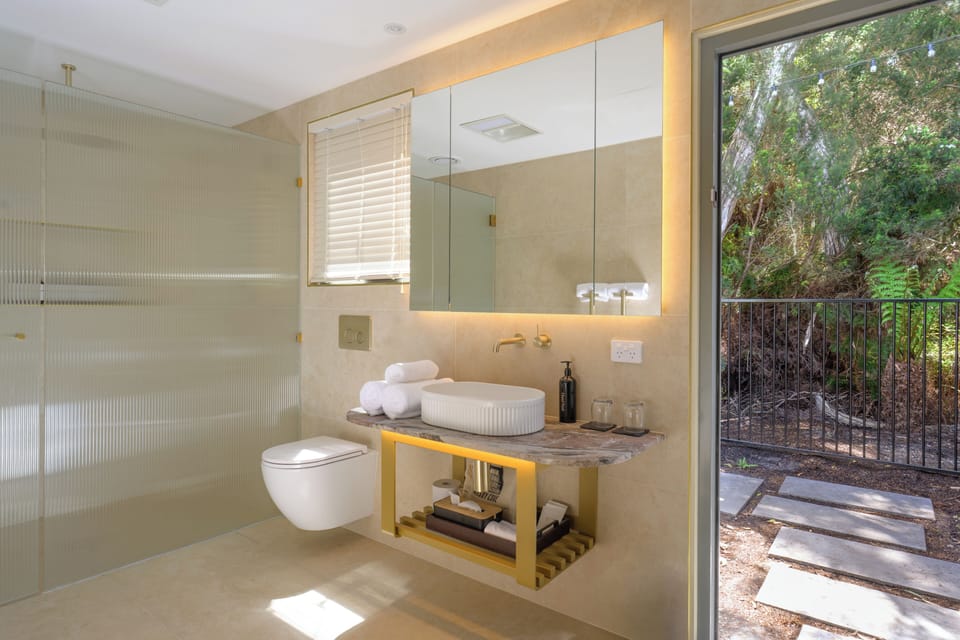 Rainforest Suites | Bathroom | Free toiletries, hair dryer, bathrobes, heated floors