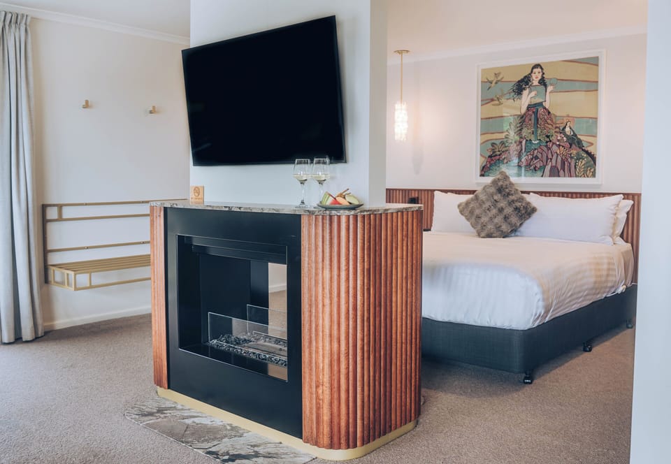 The Cove Pavilions | Living area | TV, fireplace
