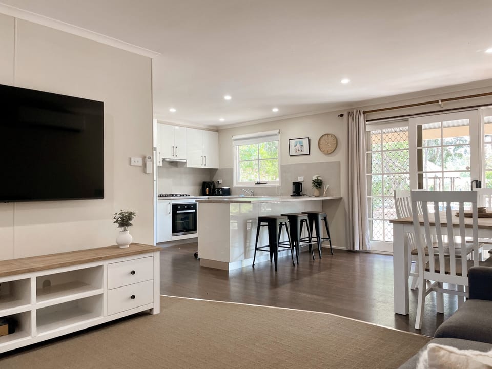 2 Bedroom Deluxe Garden View 5 | Living area | 42-inch flat-screen TV with cable channels, TV, DVD player