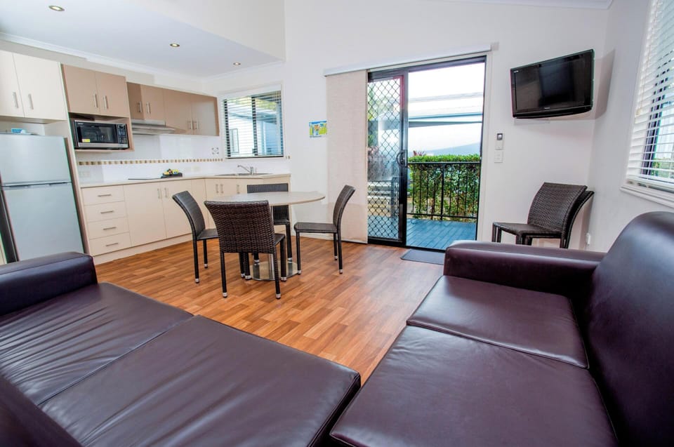 Deluxe 2 Bedroom  Cabin | Living area | TV