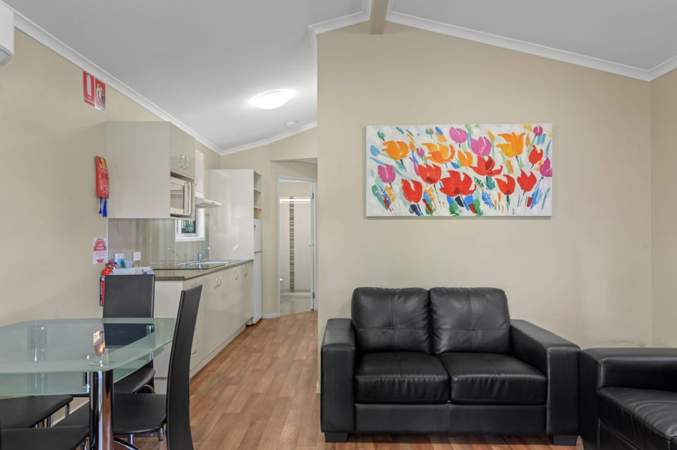 Superior 2 Bedroom Cabin - Sleep 6 | Living area | 32-inch flat-screen TV with digital channels, TV