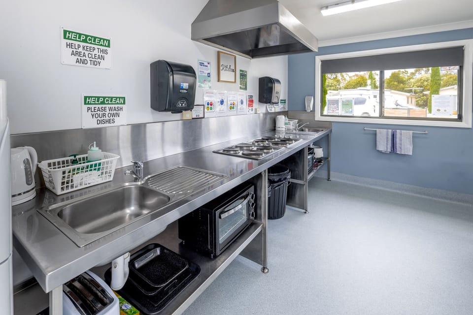 Full-size fridge, microwave, stovetop, electric kettle