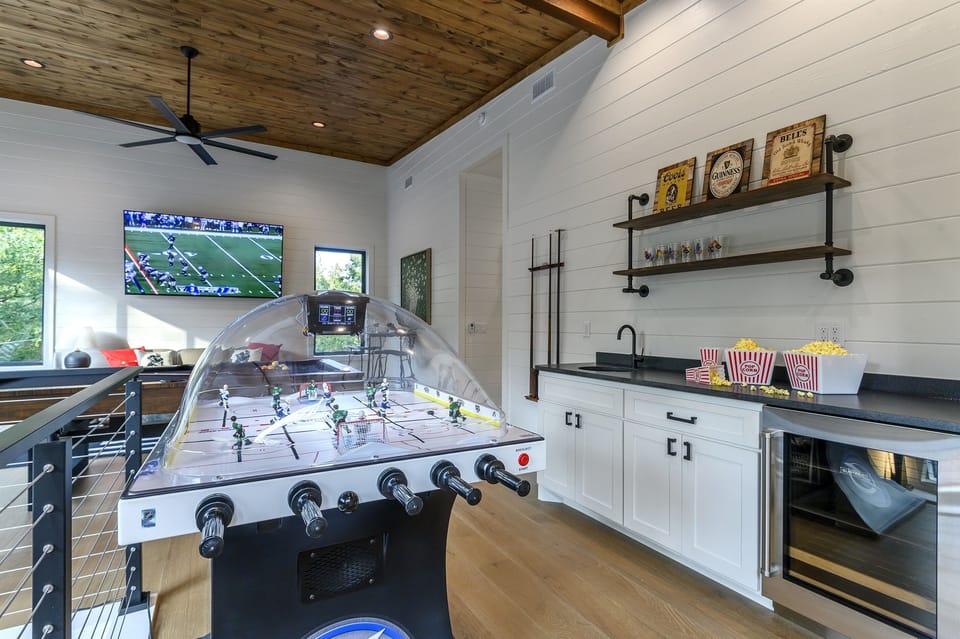 Game Room: Score big with foosball, snacks, and game-day vibes in this entertainment haven!