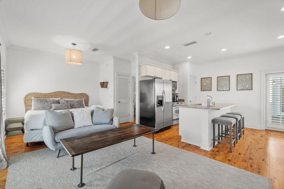 Welcome to our carriage house—a haven of convenience and comfort. This fully stocked kitchen is a culinary delight, equipped with a Keurig coffee pot and coffee pods. Equipped with full size appliances, it's a complete setup for preparing delicious meals!