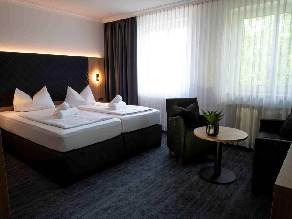 Family Double Room, 1 King Bed, Non Smoking | Individually decorated, desk, laptop workspace, free WiFi