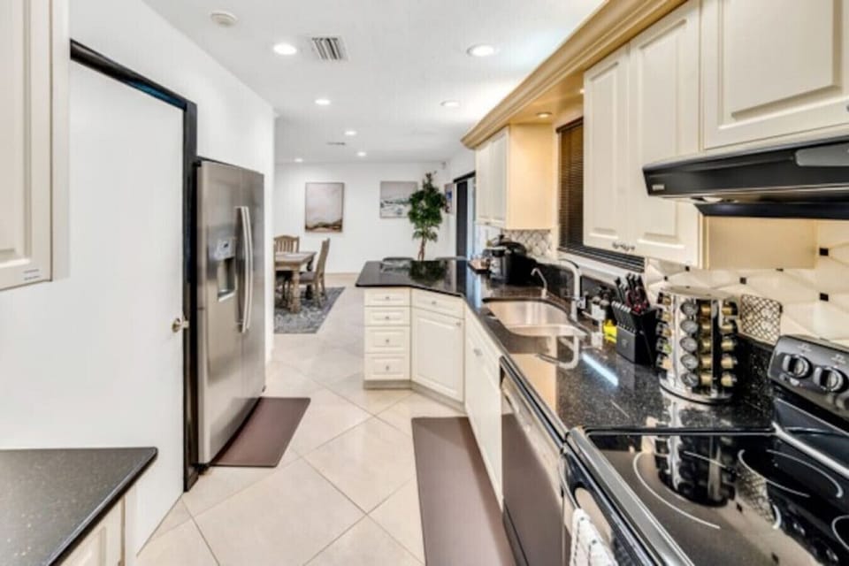 Modern kitchen fully equipped with everything needed for home cooked meals.