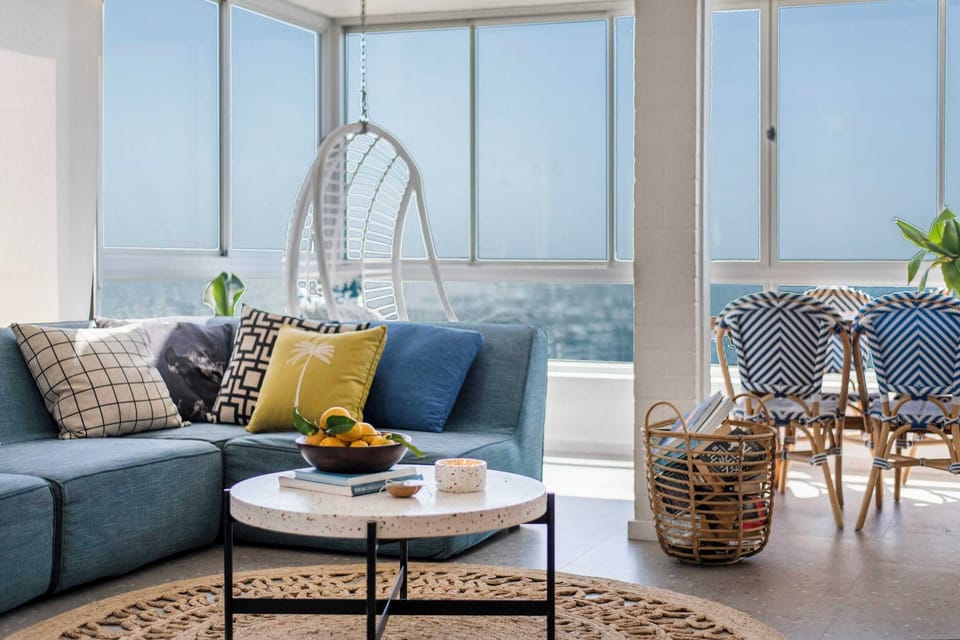 Absolute Oceanfront - Yamba Accommodation - Air-conditioned open plan kitchen, living & dining room with ocean views.