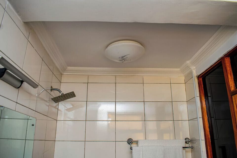 Standard Double Room | Bathroom | Free toiletries, slippers