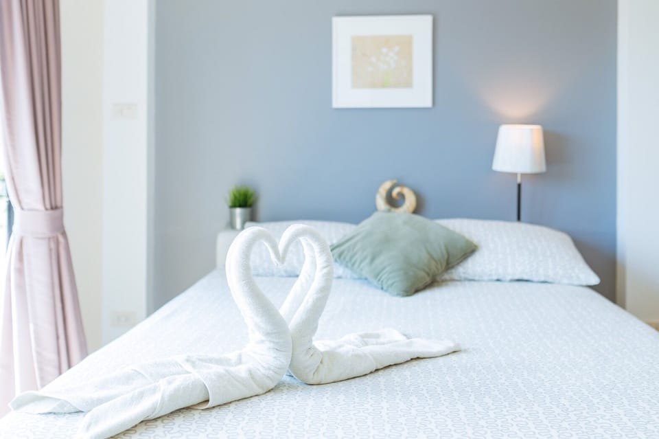 Superior Double Room, Balcony, Side Sea View | Minibar, in-room safe, desk, blackout drapes