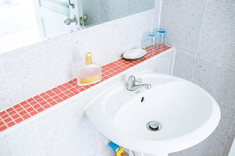 Shower, towels, soap, toilet paper