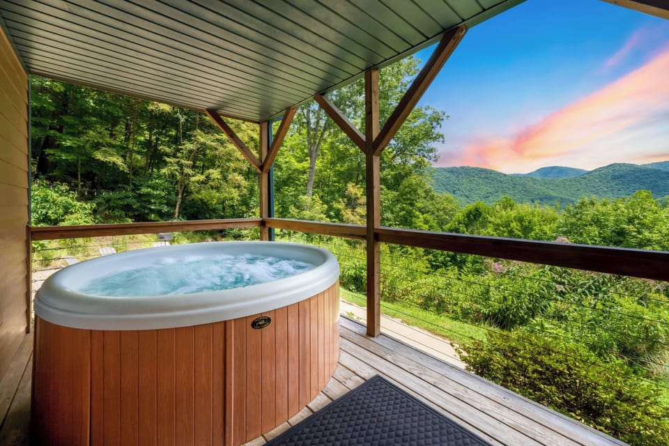 Indulge in some self-care and soak away your stress in our front porch hot tub.