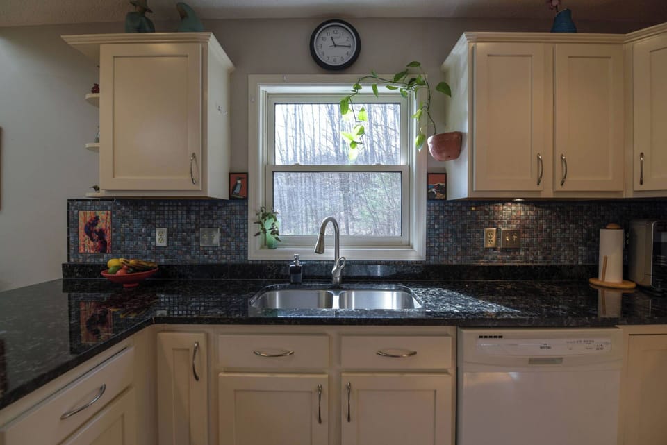 Brighten your daily chores with a windowed kitchen sink.