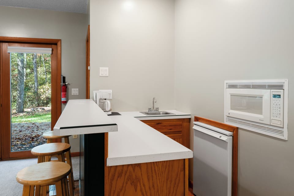 Clean and bright kitchenette.