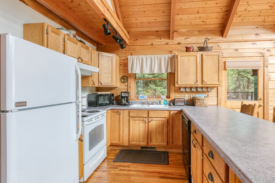 Cook up mountain feasts in the rustic, wooden kitchen of Mountain Gem.
