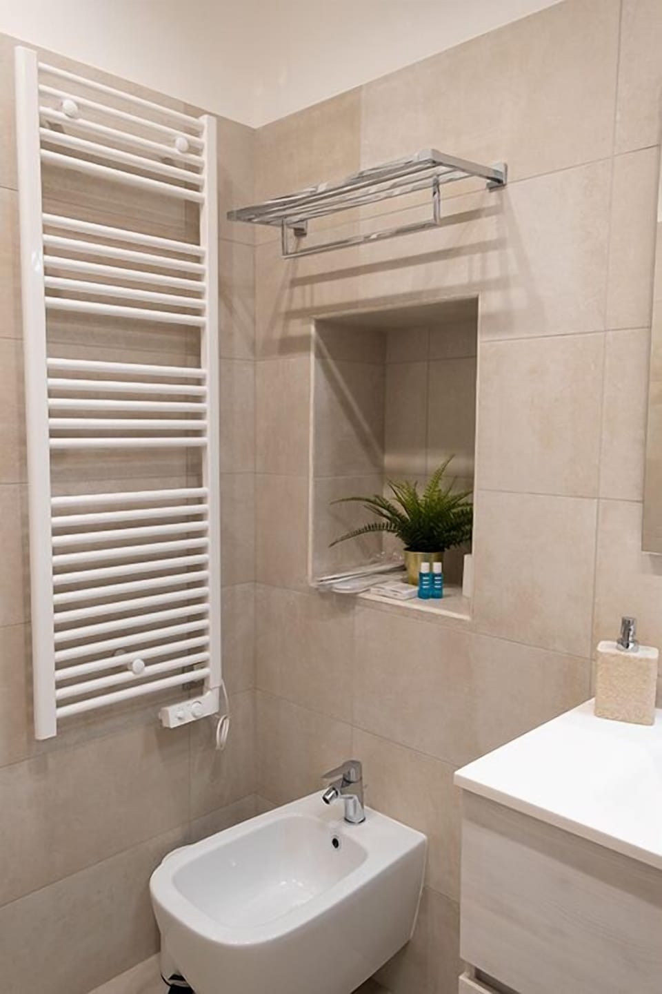 Deluxe Condo | Bathroom | Rainfall showerhead, hair dryer, slippers, bidet