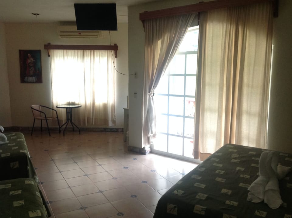 Family Triple Room, 1 Bedroom, River View | Iron/ironing board (on request), WiFi (free), bed sheets