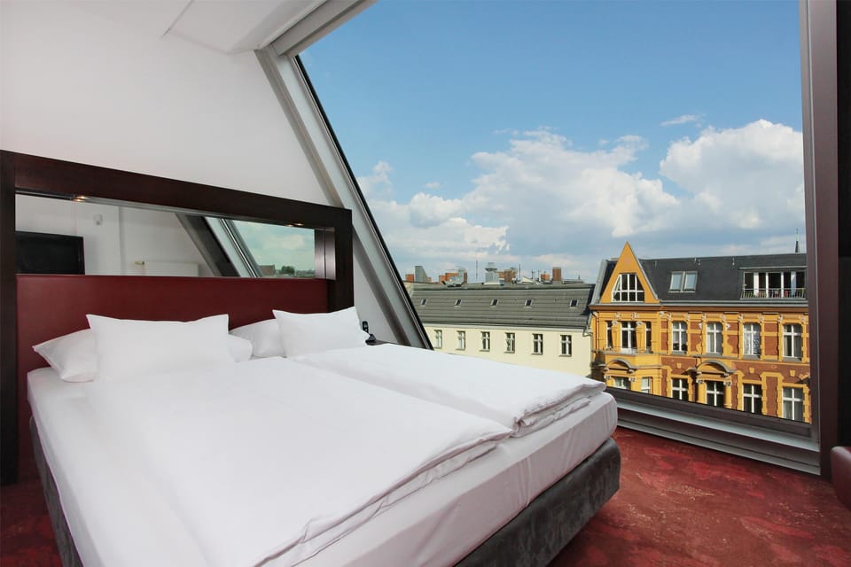 Suite, 1 King Bed with Sofa bed | Minibar, in-room safe, desk, blackout drapes