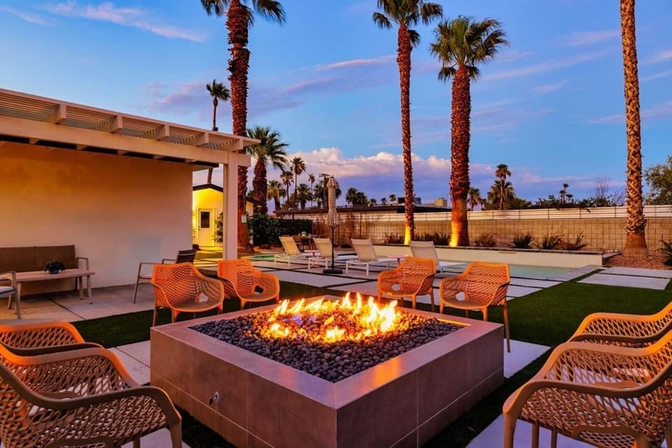 Savor a relaxed evening with friends gathered around the firepit.