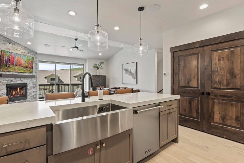 Black Rock Ridge 14488: Sparkling clean kitchen sink in a spacious, well-lit cooking area.