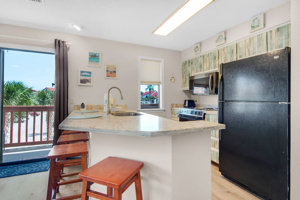 Kitchen with eat-in bar seating