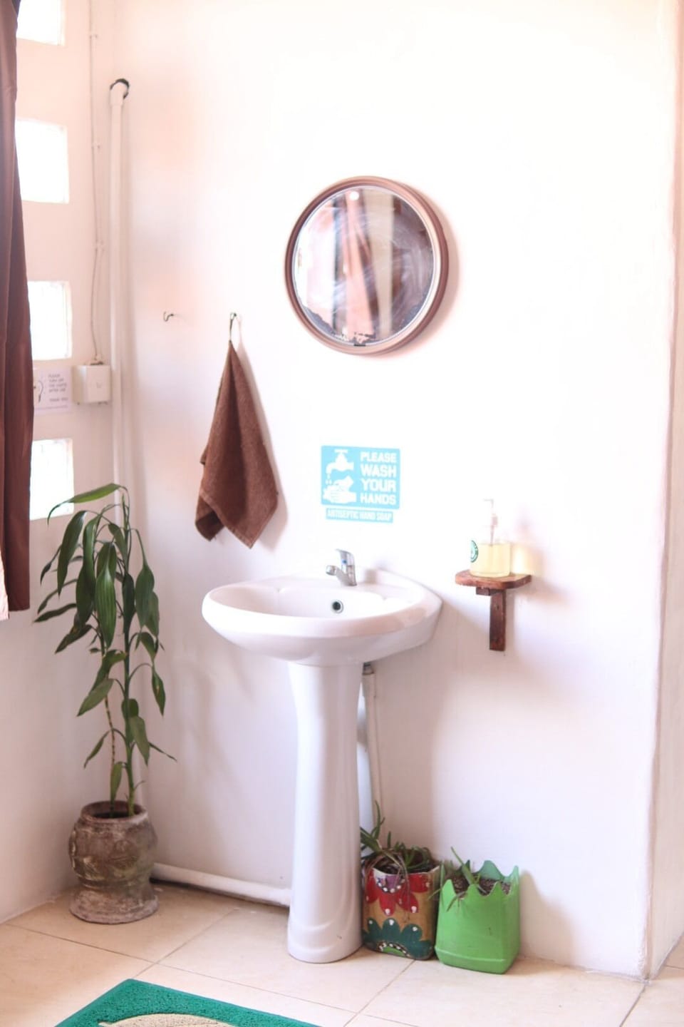 Rainfall showerhead, towels, soap, shampoo