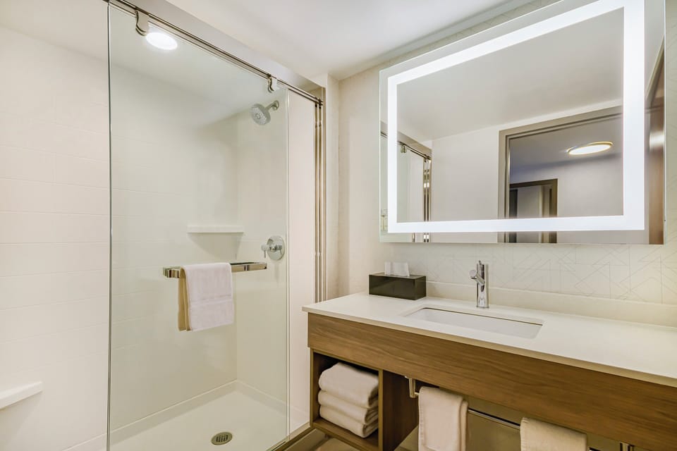 Desk, blackout drapes, iron/ironing board, free cribs/infant beds