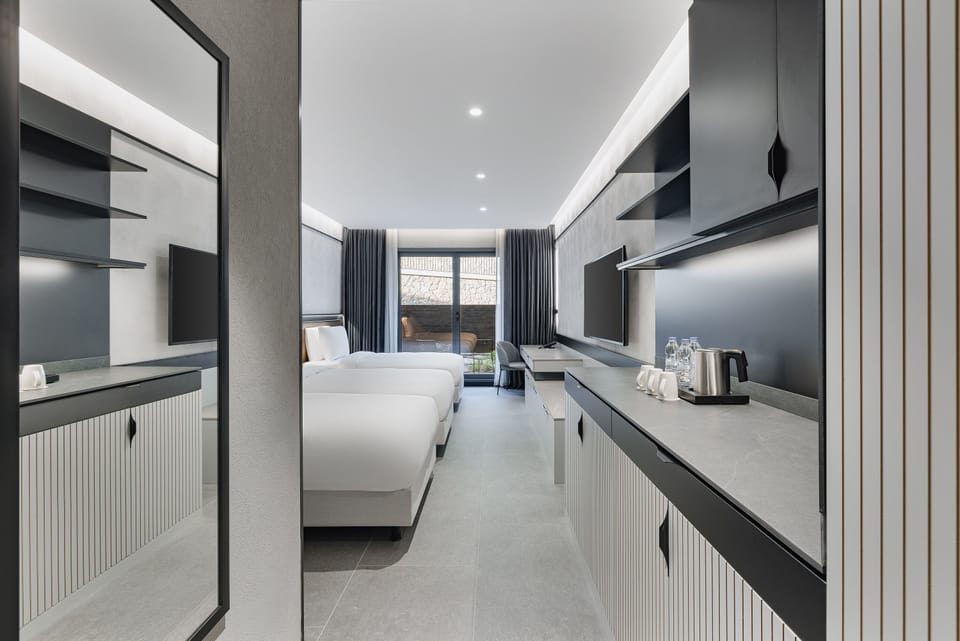Deluxe Triple Room, Garden Area | Premium bedding, in-room safe, soundproofing, iron/ironing board