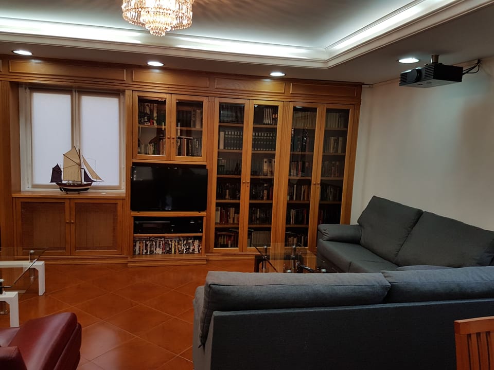 22-inch TV with satellite channels, DVD player, pay movies