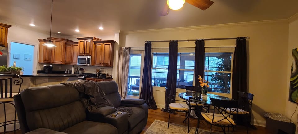Open kitchen with dining area and living room. Easy access to screened patio