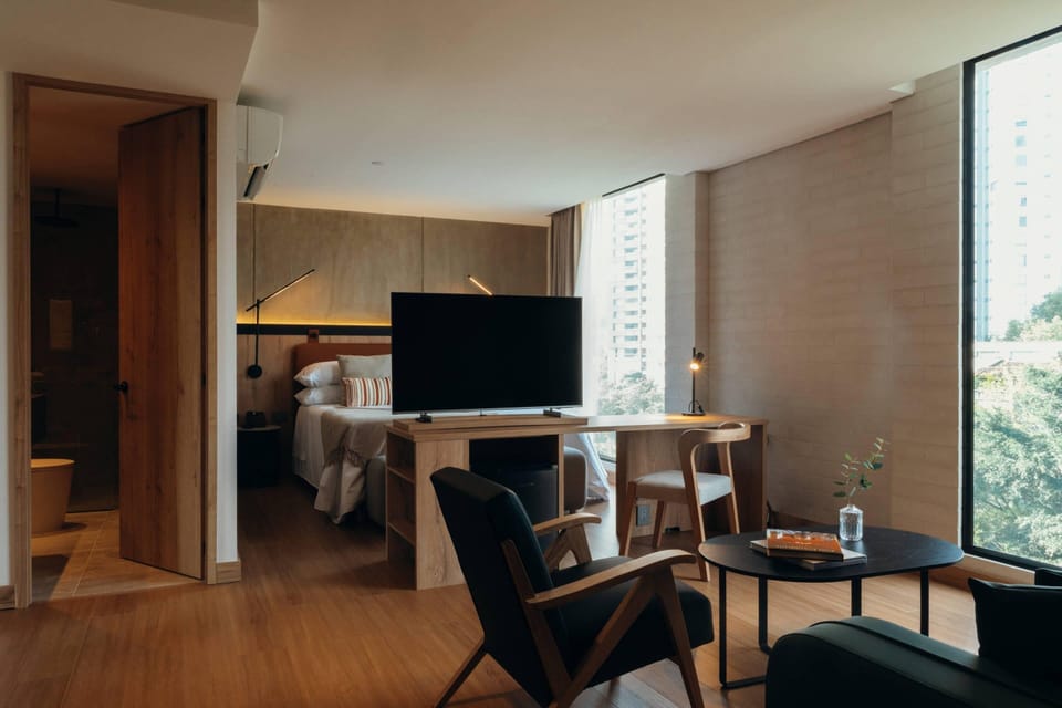 Suite, 1 King Bed, Non Smoking | Premium bedding, minibar, in-room safe, desk