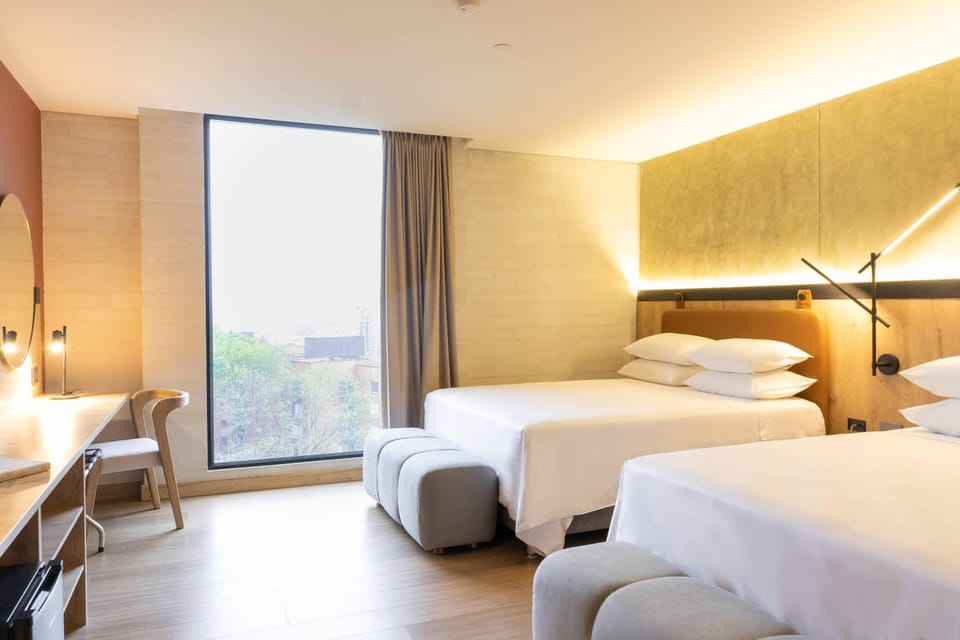Suite, 2 Queen Beds, Non Smoking | Premium bedding, minibar, in-room safe, desk
