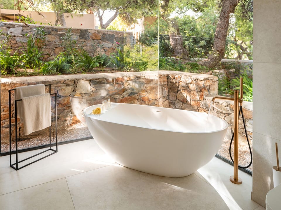 Pine Hill Villa | Bathroom | Eco-friendly toiletries, hair dryer, bathrobes, slippers