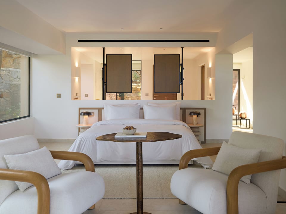 Premium bedding, down comforters, minibar, in-room safe