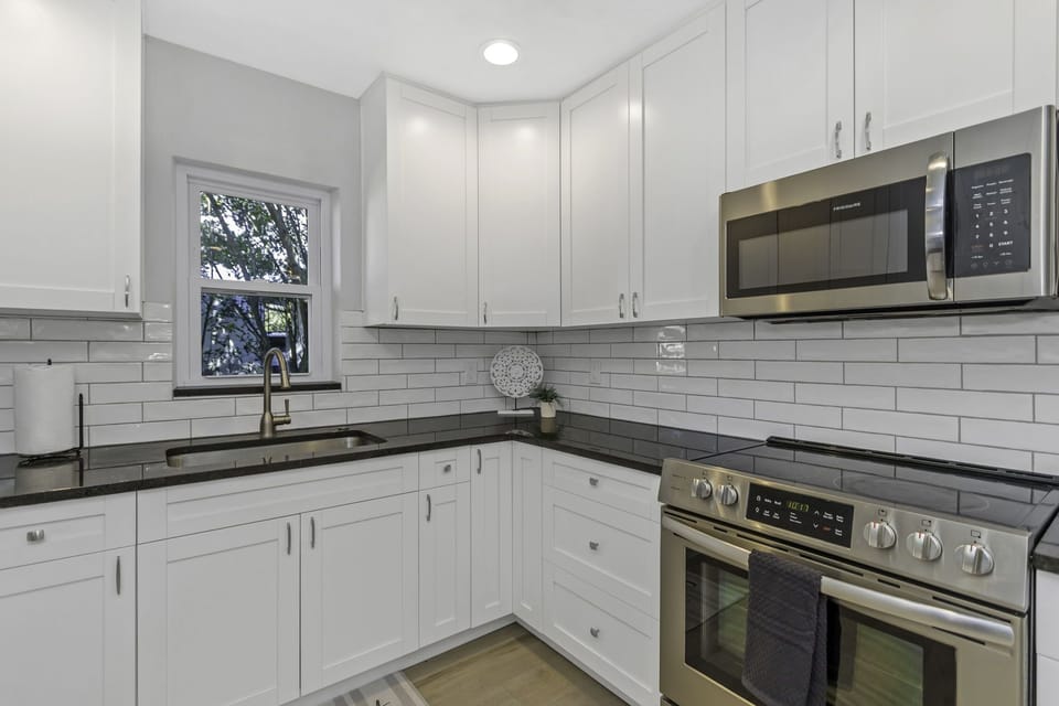 Kitchen with Granite countertops and soft close cabinets