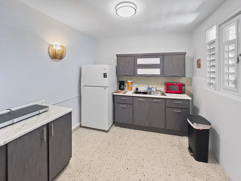 Relax in a beautifully arranged kitchen that offers warmth functionality and a calm space to enjoy your time