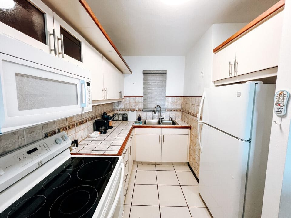 A beautifully designed kitchen space with a practical layout and everything you need to feel right at home.