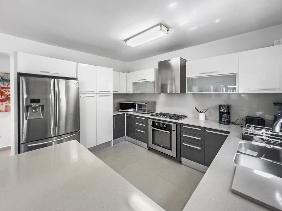 A sleek, modern kitchen designed for convenience and style.