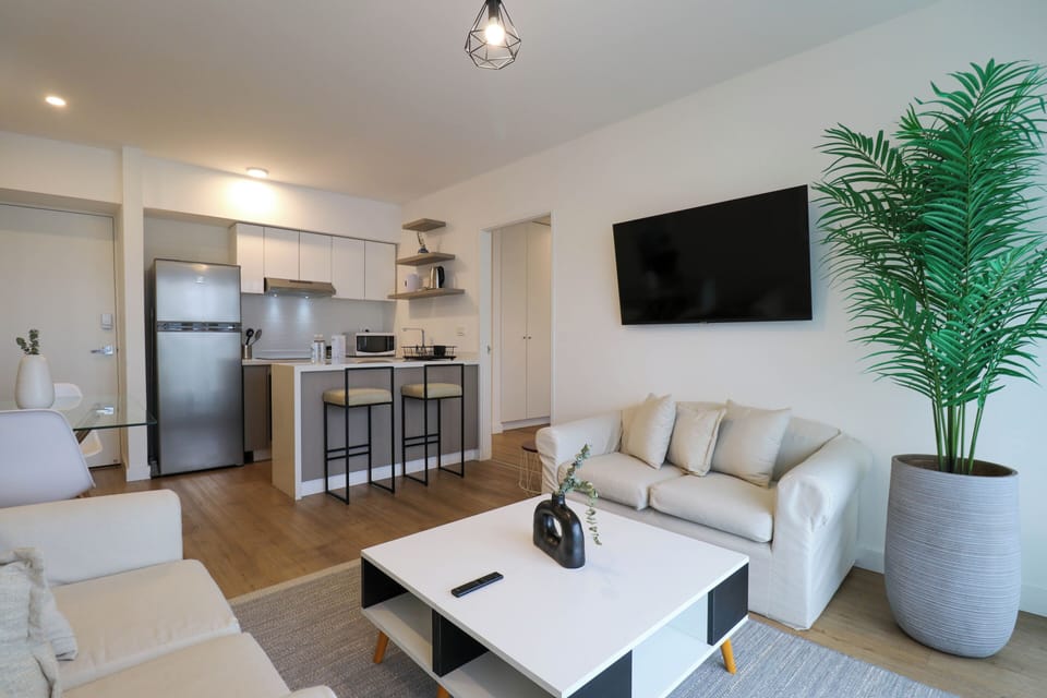 Apartment | Living area | 40-inch Smart TV with cable channels