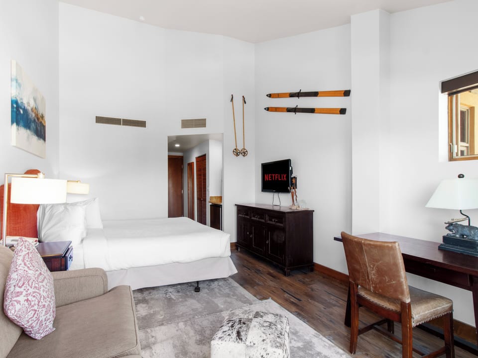 King Bed / Dedicated Workspace / Living Area