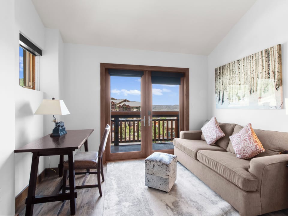 Living Area / Sleeper Sofa / Private Balcony