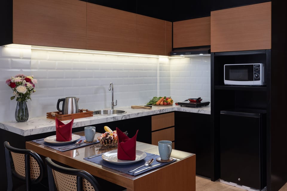 Deluxe Suite Pool Access | Private kitchenette | Mini-fridge