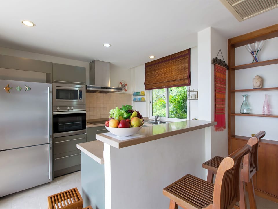 Villa | Private kitchen | Fridge, microwave, oven, stovetop