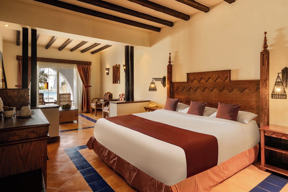 Minibar, in-room safe, iron/ironing board, bed sheets