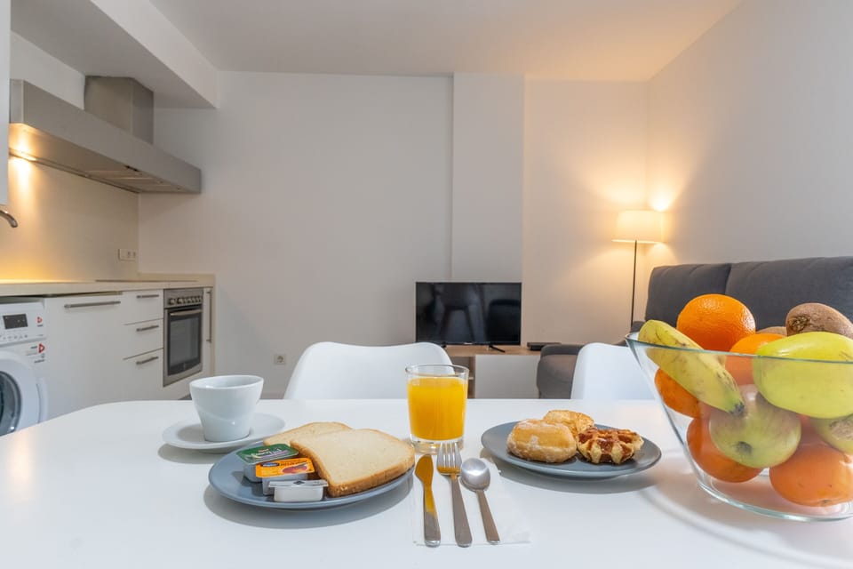 Apartment, 1 Bedroom | Living area | Flat-screen TV