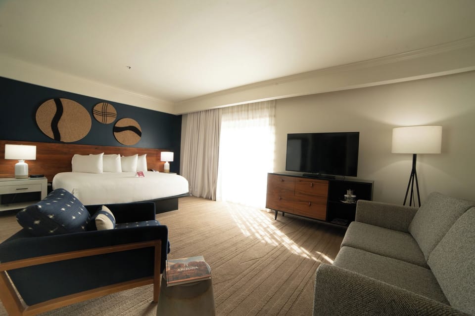 Junior Suite, Patio | Premium bedding, minibar, in-room safe, desk