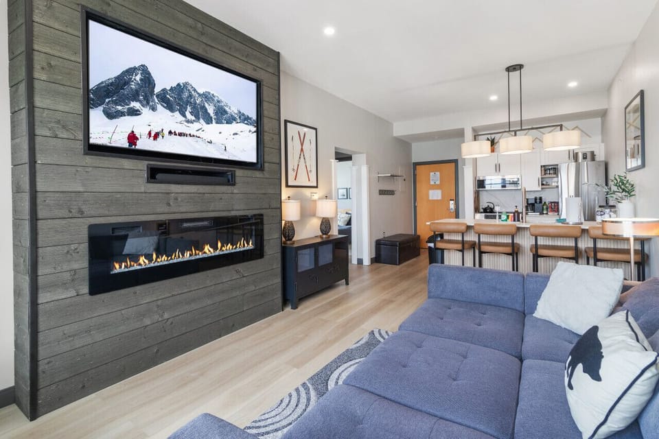 Large screen TV with fireplace