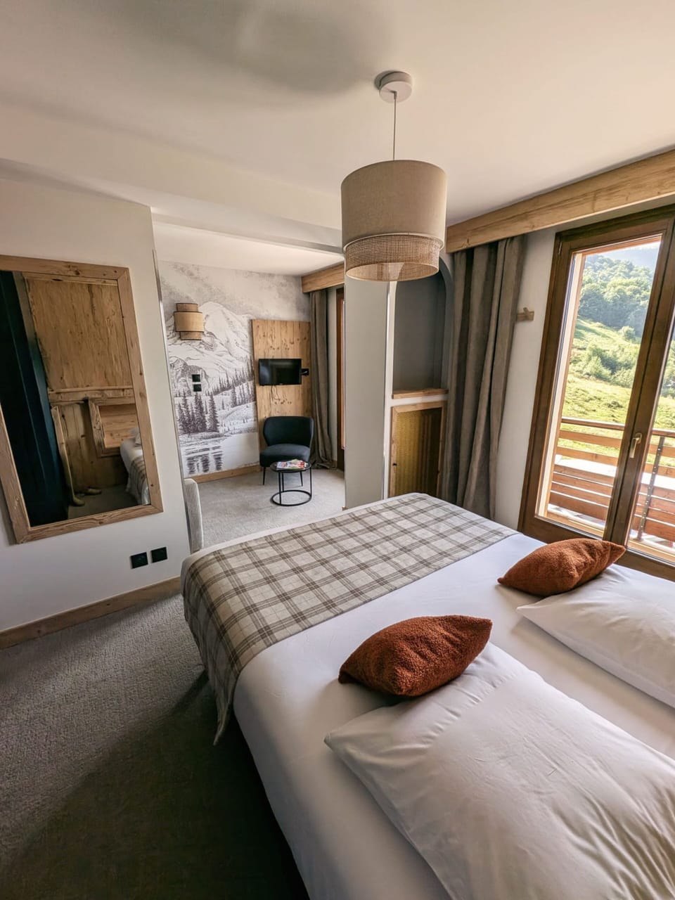 Premium bedding, desk, laptop workspace, soundproofing