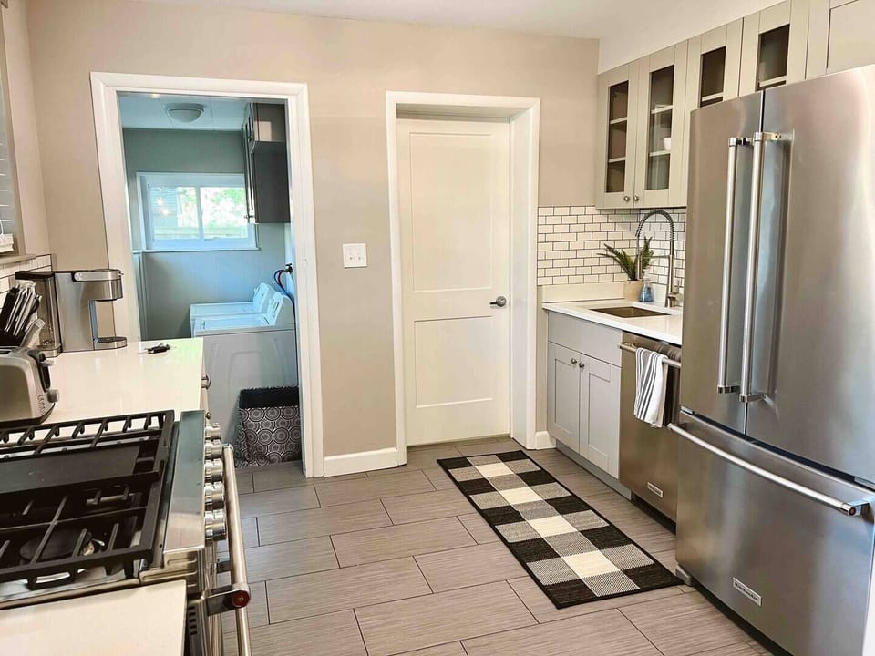 The kitchen is bright and fully appointed.
